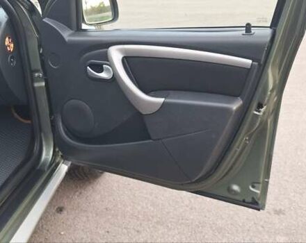 Дачия Duster 2013 в Новоархангельске на Automoto.ua Зеленый Дачия Duster, объемом двигателя 1.5 л и пробегом 198 тыс. км за 10500 $, фото 60 на Automoto.ua