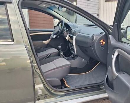 Дачия Duster 2013 в Новоархангельске на Automoto.ua Зеленый Дачия Duster, объемом двигателя 1.5 л и пробегом 198 тыс. км за 10500 $, фото 9 на Automoto.ua