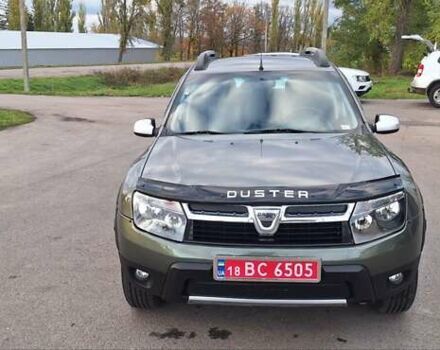 Дачия Duster 2013 в Новоархангельске на Automoto.ua Зеленый Дачия Duster, объемом двигателя 1.5 л и пробегом 198 тыс. км за 10500 $, фото 34 на Automoto.ua