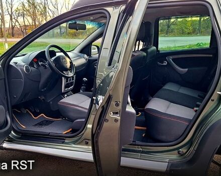 Зеленый Дачия Duster, объемом двигателя 1.5 л и пробегом 198 тыс. км за 10500 $, фото 8 на Automoto.ua
