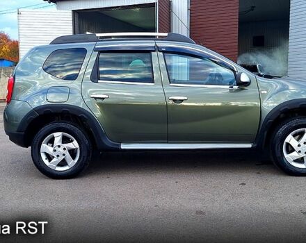 Зеленый Дачия Duster, объемом двигателя 1.5 л и пробегом 198 тыс. км за 10500 $, фото 4 на Automoto.ua