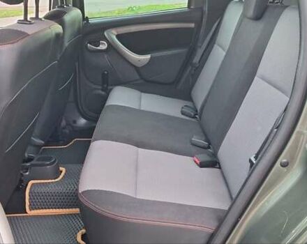 Дачия Duster 2013 в Новоархангельске на Automoto.ua Зеленый Дачия Duster, объемом двигателя 1.5 л и пробегом 198 тыс. км за 10500 $, фото 55 на Automoto.ua