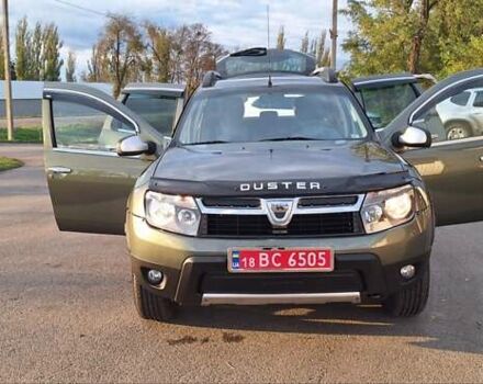 Дачия Duster 2013 в Новоархангельске на Automoto.ua Зеленый Дачия Duster, объемом двигателя 1.5 л и пробегом 198 тыс. км за 10500 $, фото 90 на Automoto.ua