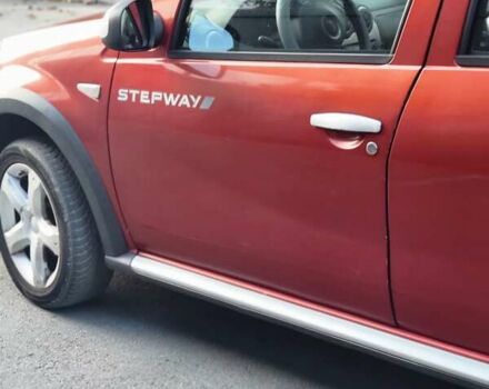 Красный Дачия Sandero StepWay, объемом двигателя 1.6 л и пробегом 127 тыс. км за 5600 $, фото 2 на Automoto.ua