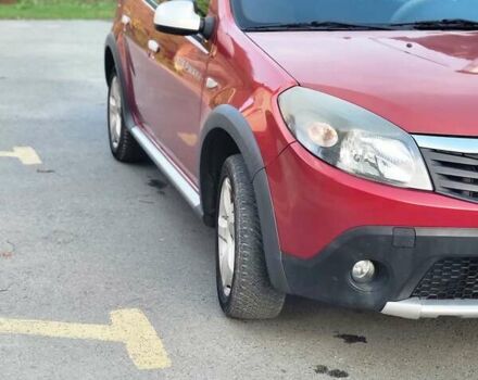 Красный Дачия Sandero StepWay, объемом двигателя 1.6 л и пробегом 127 тыс. км за 5600 $, фото 1 на Automoto.ua