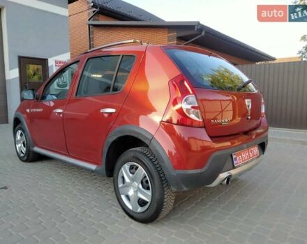 Красный Дачия Sandero StepWay, объемом двигателя 1.6 л и пробегом 184 тыс. км за 5999 $, фото 2 на Automoto.ua