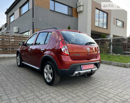 Красный Дачия Sandero StepWay, объемом двигателя 1.6 л и пробегом 145 тыс. км за 6549 $, фото 32 на Automoto.ua