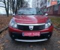 Красный Дачия Sandero StepWay, объемом двигателя 1.6 л и пробегом 145 тыс. км за 7300 $, фото 1 на Automoto.ua