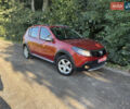 Красный Дачия Sandero StepWay, объемом двигателя 1.6 л и пробегом 220 тыс. км за 6999 $, фото 1 на Automoto.ua