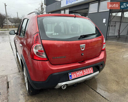 Красный Дачия Sandero StepWay, объемом двигателя 1.6 л и пробегом 185 тыс. км за 7350 $, фото 1 на Automoto.ua