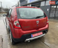 Красный Дачия Sandero StepWay, объемом двигателя 1.6 л и пробегом 185 тыс. км за 7350 $, фото 1 на Automoto.ua