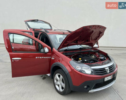 Красный Дачия Sandero StepWay, объемом двигателя 1.6 л и пробегом 139 тыс. км за 7350 $, фото 136 на Automoto.ua