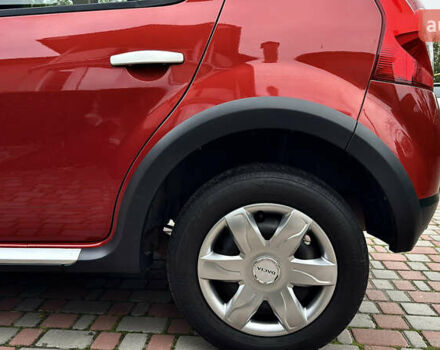 Красный Дачия Sandero StepWay, объемом двигателя 1.6 л и пробегом 115 тыс. км за 7599 $, фото 81 на Automoto.ua
