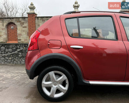 Красный Дачия Sandero StepWay, объемом двигателя 1.6 л и пробегом 163 тыс. км за 6950 $, фото 94 на Automoto.ua