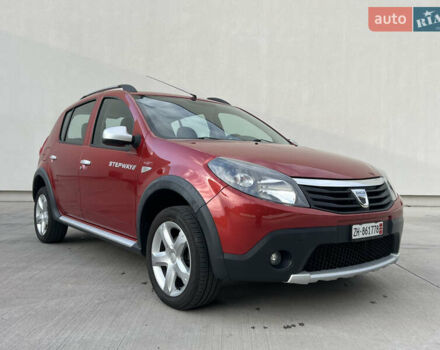 Красный Дачия Sandero StepWay, объемом двигателя 1.6 л и пробегом 139 тыс. км за 7350 $, фото 1 на Automoto.ua