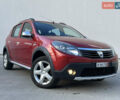 Красный Дачия Sandero StepWay, объемом двигателя 1.6 л и пробегом 139 тыс. км за 7350 $, фото 1 на Automoto.ua