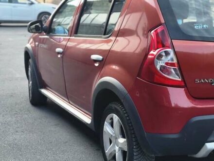 Красный Дачия Sandero StepWay, объемом двигателя 1.6 л и пробегом 127 тыс. км за 5600 $, фото 1 на Automoto.ua