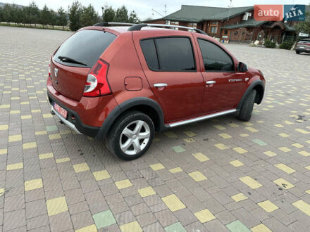 Красный Дачия Sandero StepWay, объемом двигателя 1.6 л и пробегом 150 тыс. км за 5999 $, фото 1 на Automoto.ua