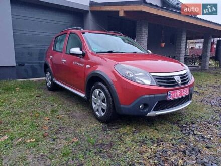 Красный Дачия Sandero StepWay, объемом двигателя 1.6 л и пробегом 170 тыс. км за 5500 $, фото 1 на Automoto.ua