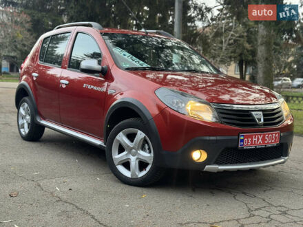 Красный Дачия Sandero StepWay, объемом двигателя 1.6 л и пробегом 135 тыс. км за 6750 $, фото 1 на Automoto.ua