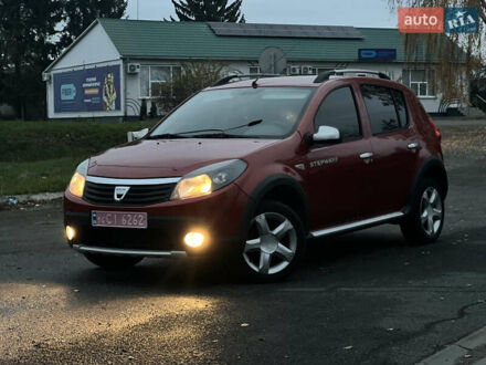 Красный Дачия Sandero StepWay, объемом двигателя 1.6 л и пробегом 170 тыс. км за 6799 $, фото 1 на Automoto.ua