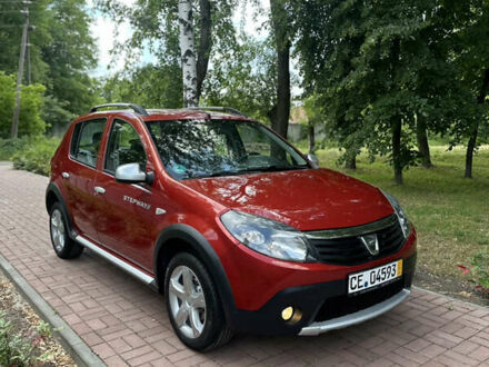 Красный Дачия Sandero StepWay, объемом двигателя 1.6 л и пробегом 163 тыс. км за 6850 $, фото 1 на Automoto.ua