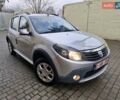 Серый Дачия Sandero StepWay, объемом двигателя 1.6 л и пробегом 200 тыс. км за 5700 $, фото 1 на Automoto.ua