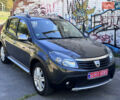 Серый Дачия Sandero StepWay, объемом двигателя 1.6 л и пробегом 173 тыс. км за 6799 $, фото 2 на Automoto.ua