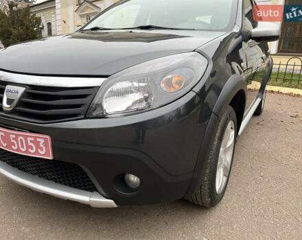 Серый Дачия Sandero StepWay, объемом двигателя 1.6 л и пробегом 60 тыс. км за 6999 $, фото 121 на Automoto.ua