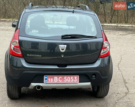 Серый Дачия Sandero StepWay, объемом двигателя 1.6 л и пробегом 60 тыс. км за 6999 $, фото 173 на Automoto.ua
