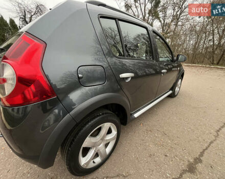 Серый Дачия Sandero StepWay, объемом двигателя 1.6 л и пробегом 60 тыс. км за 6999 $, фото 131 на Automoto.ua