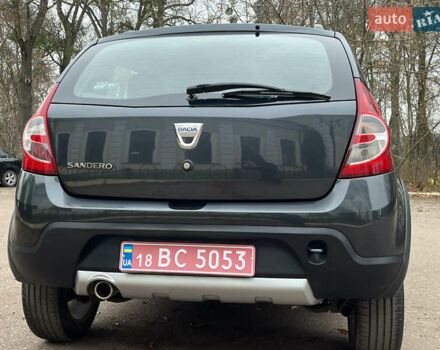 Серый Дачия Sandero StepWay, объемом двигателя 1.6 л и пробегом 60 тыс. км за 6999 $, фото 176 на Automoto.ua