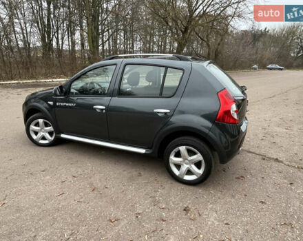Серый Дачия Sandero StepWay, объемом двигателя 1.6 л и пробегом 60 тыс. км за 6999 $, фото 166 на Automoto.ua