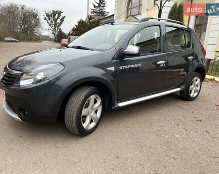 Серый Дачия Sandero StepWay, объемом двигателя 1.6 л и пробегом 60 тыс. км за 6999 $, фото 158 на Automoto.ua
