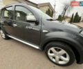 Серый Дачия Sandero StepWay, объемом двигателя 1.6 л и пробегом 60 тыс. км за 6999 $, фото 137 на Automoto.ua