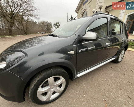 Серый Дачия Sandero StepWay, объемом двигателя 1.6 л и пробегом 60 тыс. км за 6999 $, фото 122 на Automoto.ua