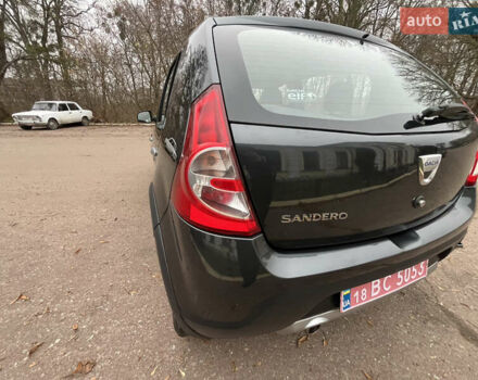 Серый Дачия Sandero StepWay, объемом двигателя 1.6 л и пробегом 60 тыс. км за 6999 $, фото 127 на Automoto.ua