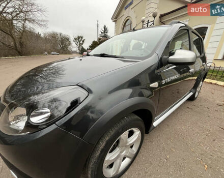 Серый Дачия Sandero StepWay, объемом двигателя 1.6 л и пробегом 60 тыс. км за 6999 $, фото 120 на Automoto.ua