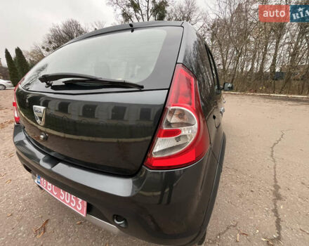 Серый Дачия Sandero StepWay, объемом двигателя 1.6 л и пробегом 60 тыс. км за 6999 $, фото 128 на Automoto.ua