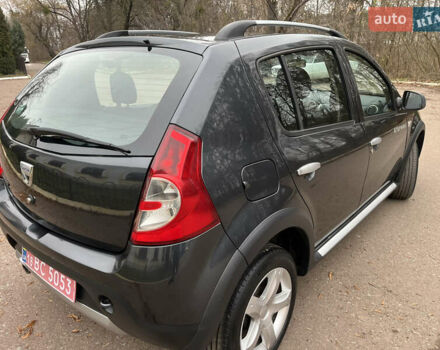 Серый Дачия Sandero StepWay, объемом двигателя 1.6 л и пробегом 60 тыс. км за 6999 $, фото 24 на Automoto.ua