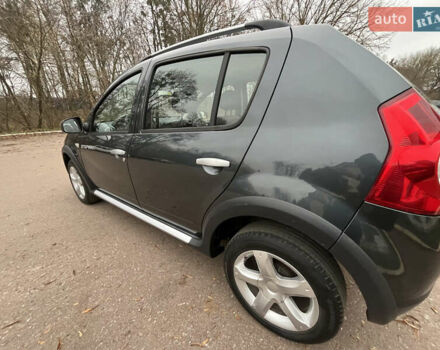 Серый Дачия Sandero StepWay, объемом двигателя 1.6 л и пробегом 60 тыс. км за 6999 $, фото 124 на Automoto.ua