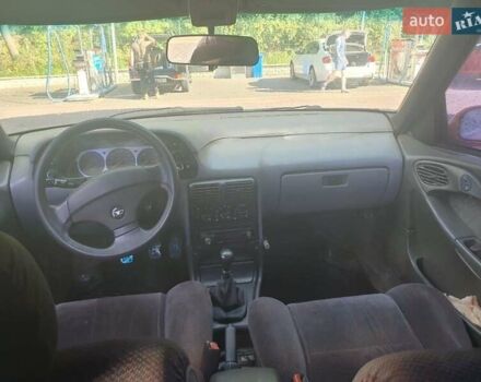 Красный Дэу Эсперо, объемом двигателя 2 л и пробегом 400 тыс. км за 1800 $, фото 2 на Automoto.ua