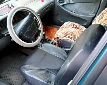 Зеленый Дэу Эсперо, объемом двигателя 2 л и пробегом 318 тыс. км за 1250 $, фото 3 на Automoto.ua