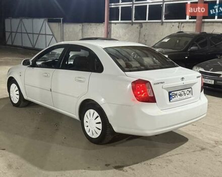 Білий Деу Джентра, об'ємом двигуна 1.49 л та пробігом 200 тис. км за 2999 $, фото 3 на Automoto.ua