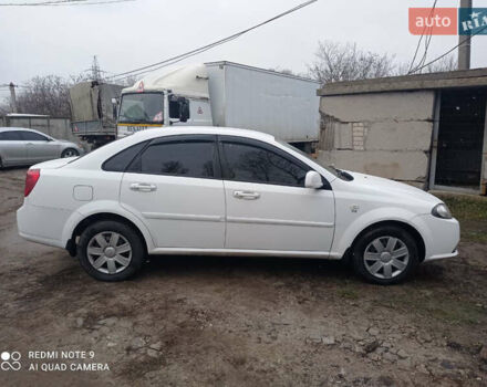 Білий Деу Джентра, об'ємом двигуна 1.49 л та пробігом 250 тис. км за 3800 $, фото 1 на Automoto.ua