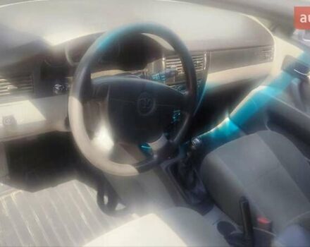 Белый Дэу Джентра, объемом двигателя 1.49 л и пробегом 170 тыс. км за 3300 $, фото 3 на Automoto.ua