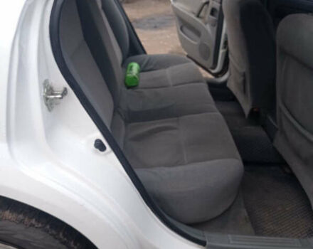 Білий Деу Джентра, об'ємом двигуна 1.49 л та пробігом 250 тис. км за 3800 $, фото 6 на Automoto.ua