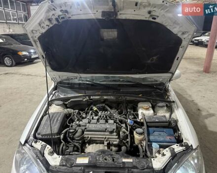 Білий Деу Джентра, об'ємом двигуна 1.49 л та пробігом 200 тис. км за 2999 $, фото 11 на Automoto.ua