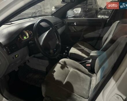 Білий Деу Джентра, об'ємом двигуна 1.49 л та пробігом 200 тис. км за 2999 $, фото 9 на Automoto.ua