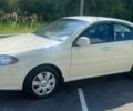 Бежевий Деу Джентра, об'ємом двигуна 1.49 л та пробігом 140 тис. км за 5799 $, фото 1 на Automoto.ua